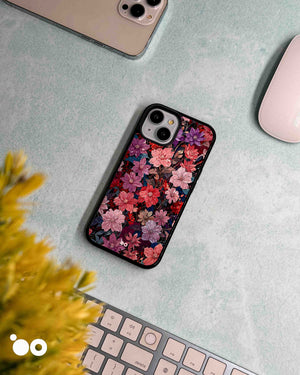 Midnight Bloom floral iPhone case featuring pink, crimson and violet blossoms with dark vintage botanical detailing