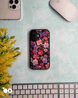 Midnight Bloom floral iPhone case featuring pink, crimson and violet blossoms with dark vintage botanical detailing