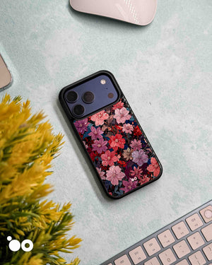 Midnight Bloom floral iPhone case featuring pink, crimson and violet blossoms with dark vintage botanical detailing