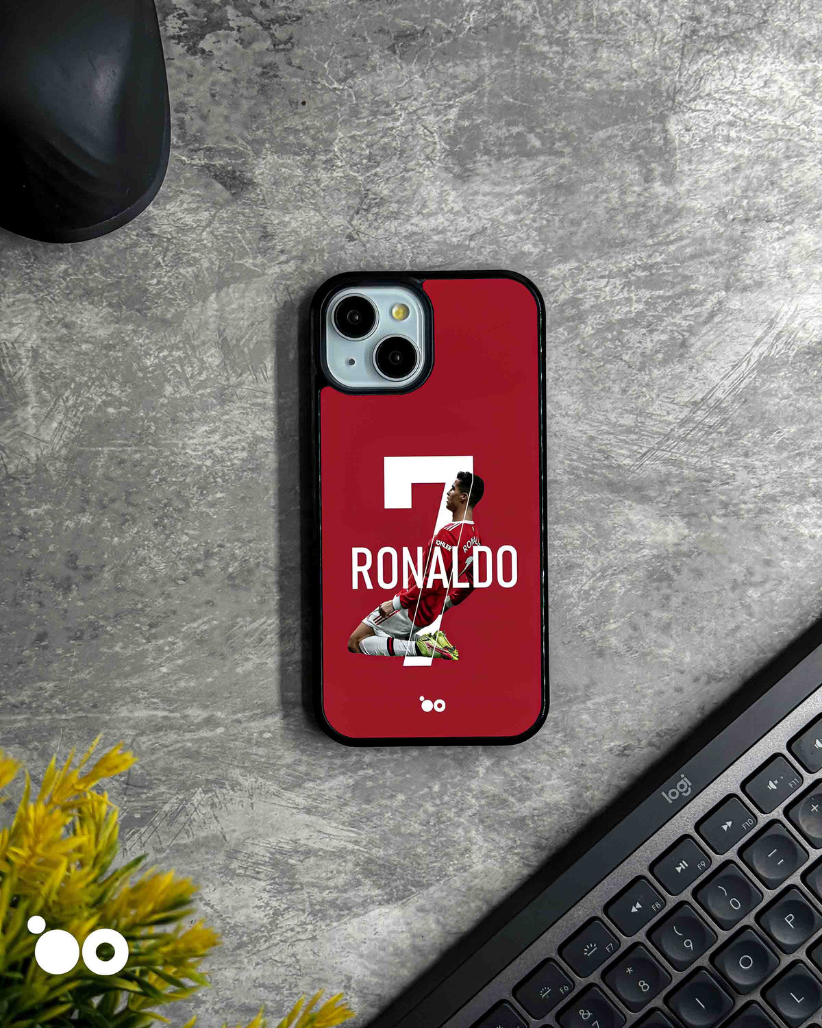 Cristiano Ronaldo No. 7 iPhone case featuring a Manchester United celebration pose on a bold red background