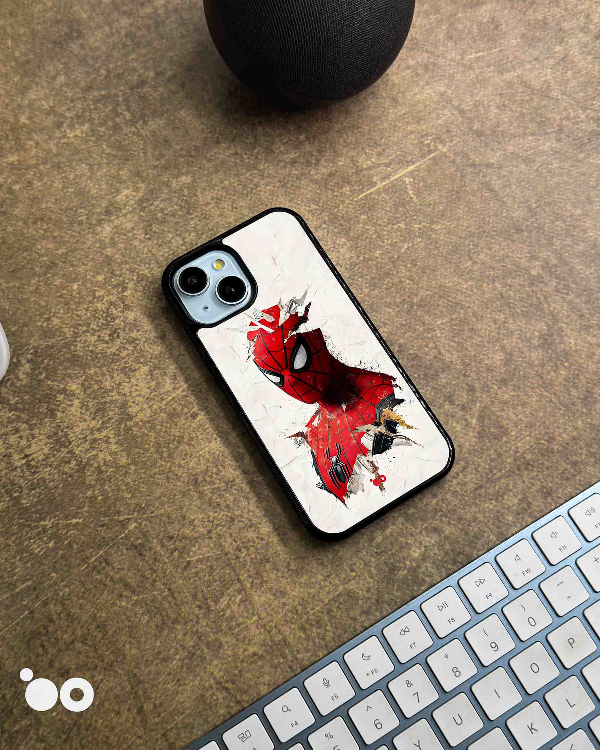 Shattered Web Spider-Man iPhone case featuring red superhero artwork with torn-paper effects on a distressed white background
