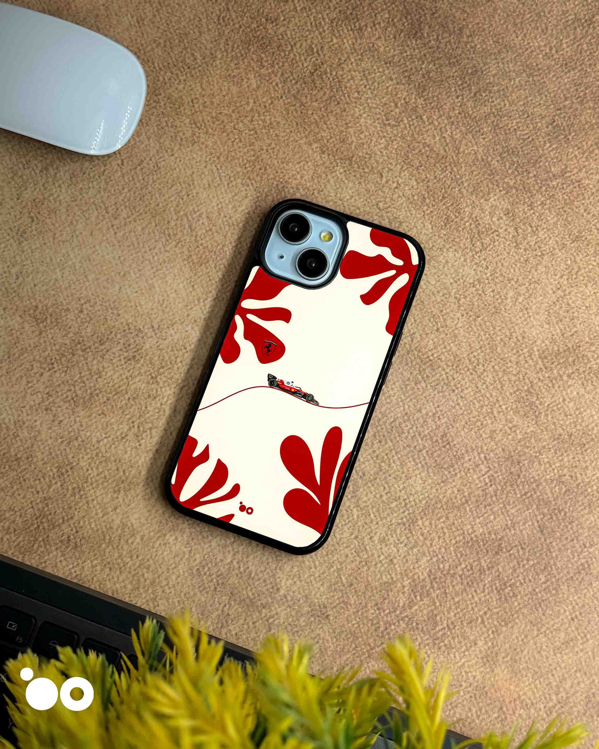 Scuderia Flow iPhone case featuring a miniature Ferrari Formula 1 car, flowing track line and red floral artwork on ivory