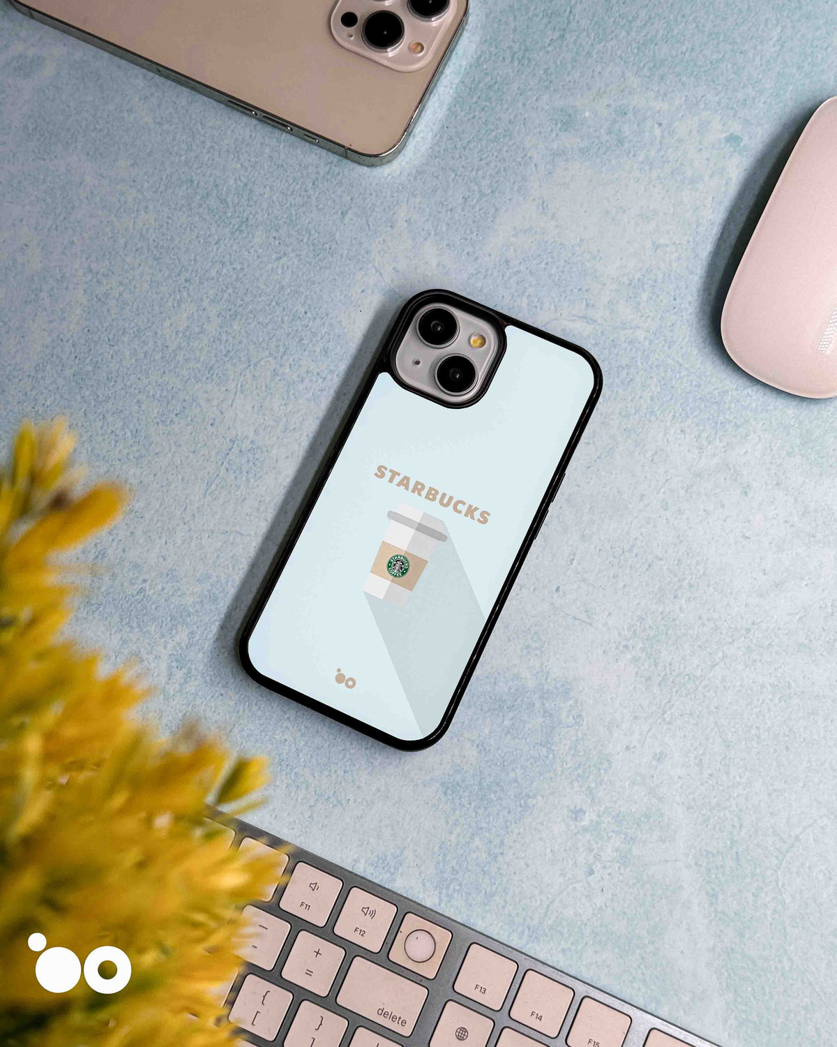 Coffee in Perspective iPhone case design with a Starbucks takeaway cup, beige lettering and diagonal shadow on pale blue