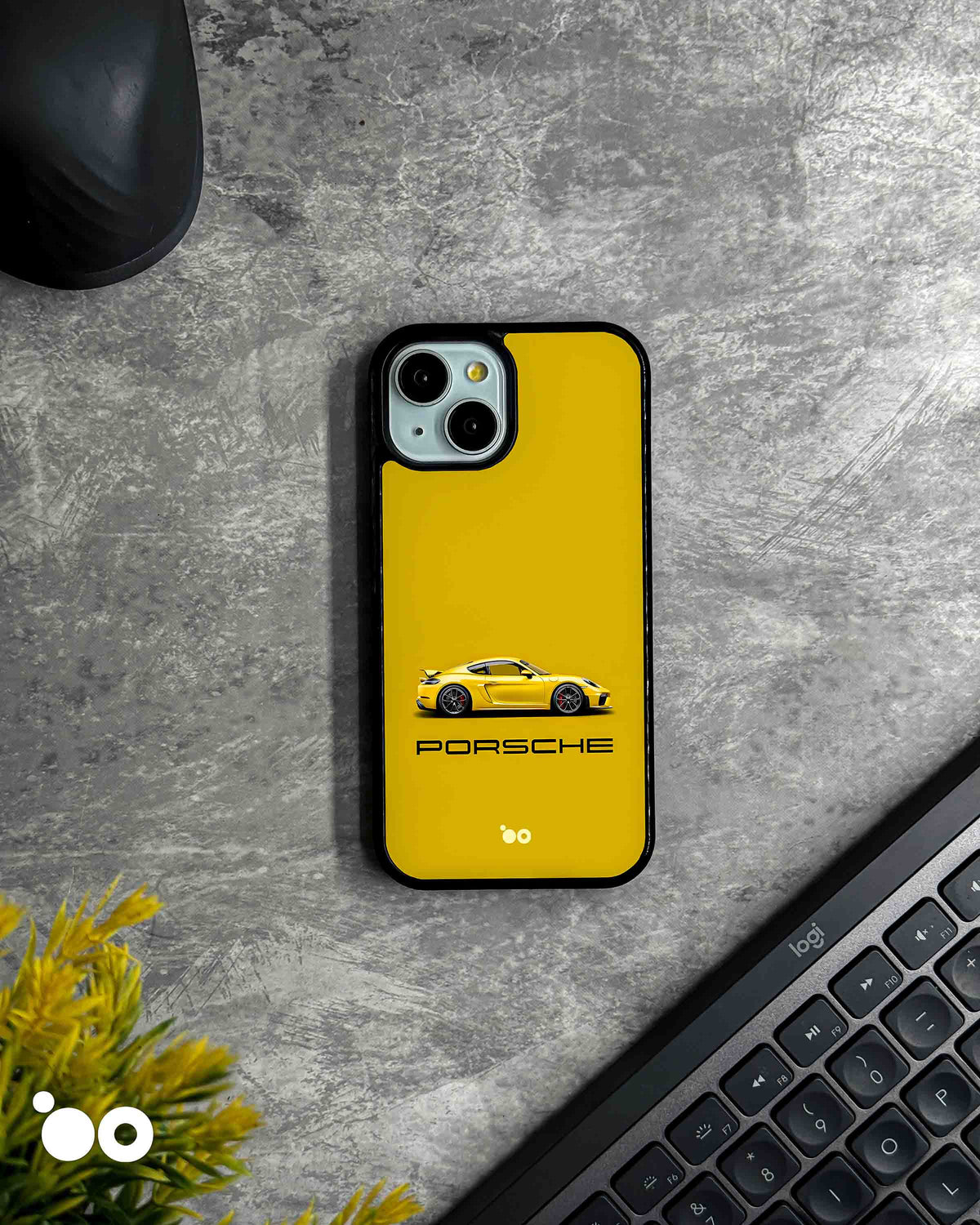 Porsche Yellow iPhone case featuring a sleek yellow Porsche sports car in side profile, minimalist black Porsche typography and a vibrant yellow background.
