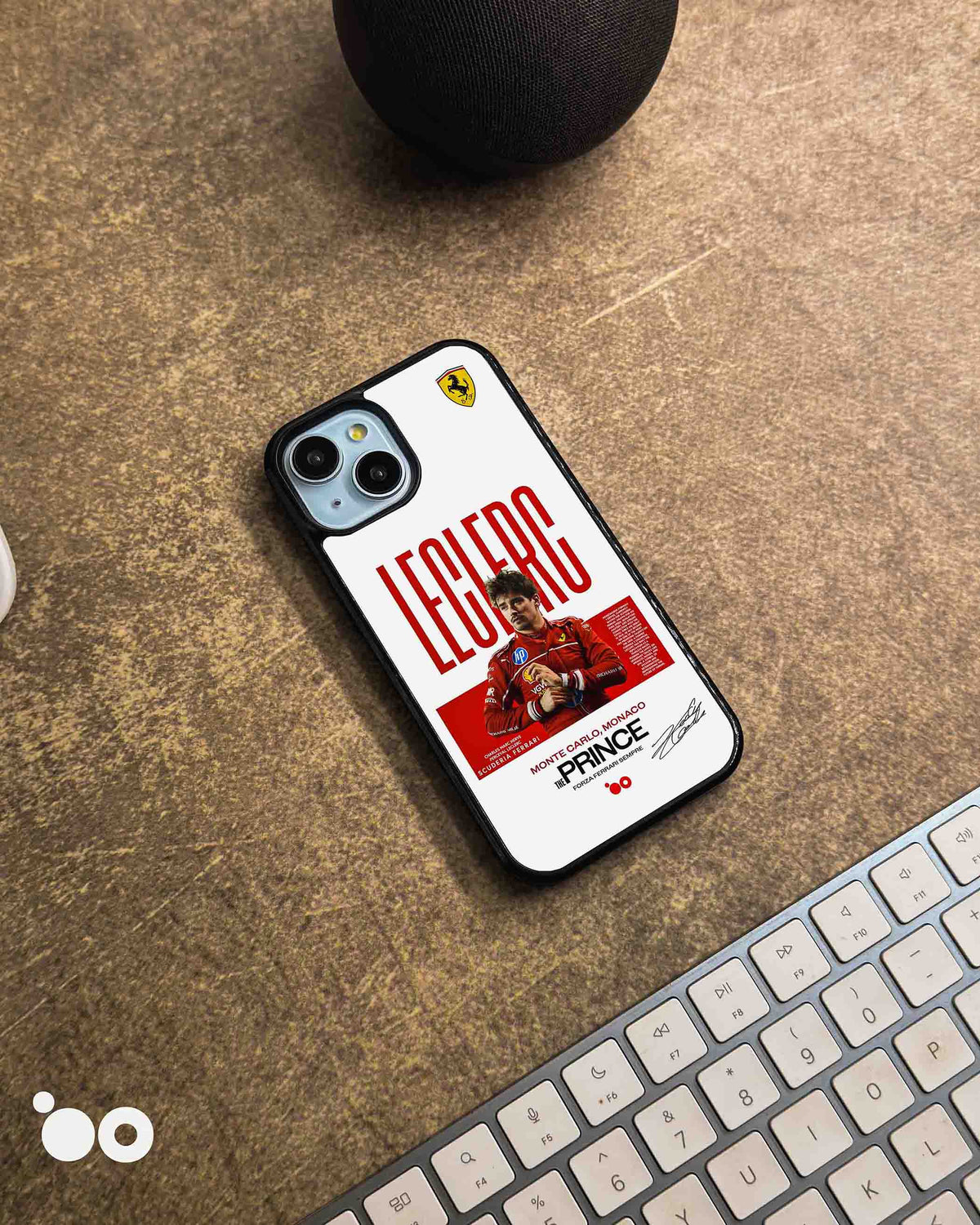 Charles Leclerc Ferrari Formula One iPhone case featuring Leclerc in his red Scuderia Ferrari racing suit, bold LECLERC typography and Monaco-inspired editorial graphics on a white background.