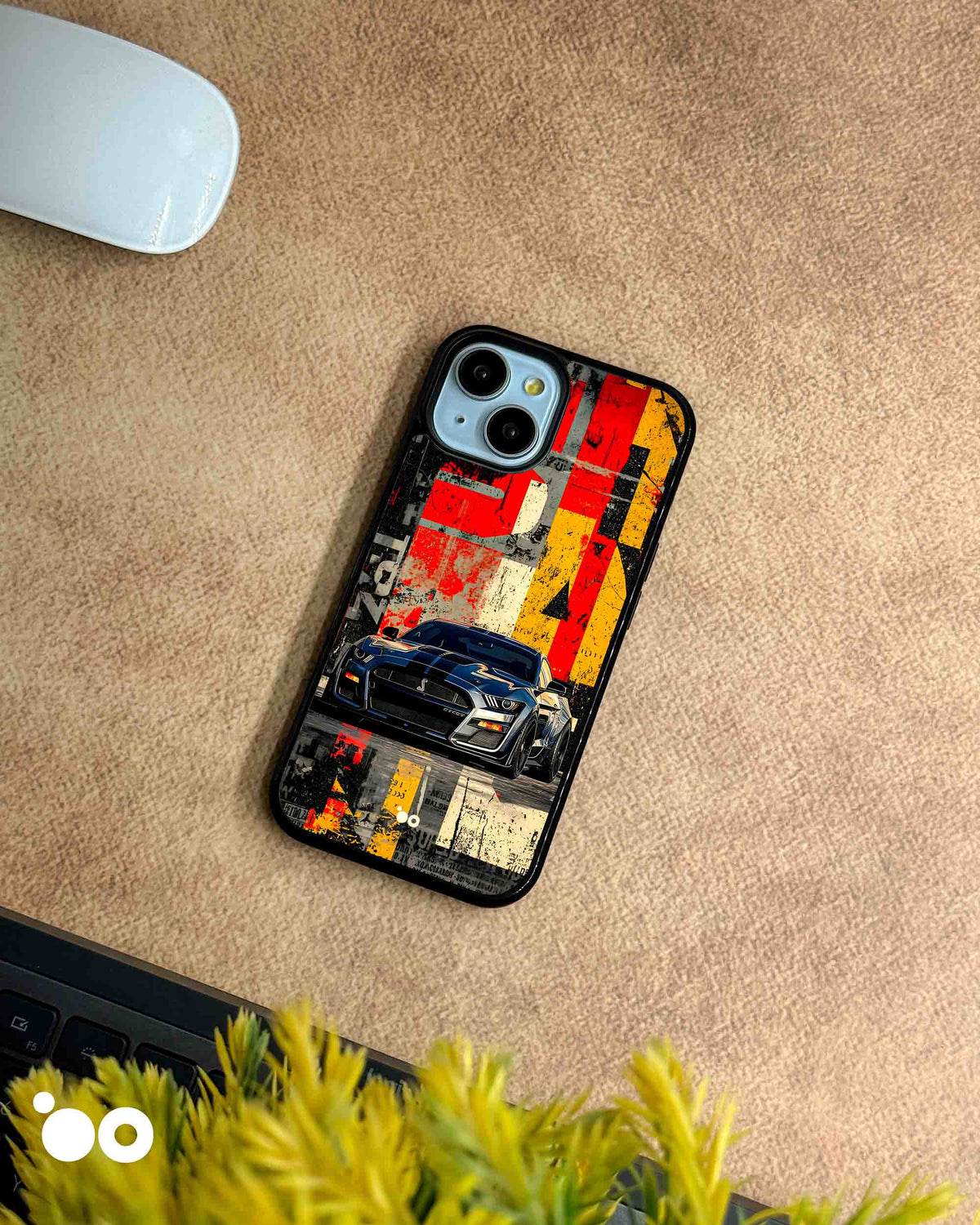 Asphalt Rebellion iPhone case featuring a dark Ford Mustang muscle car with distressed red, yellow and black graphics