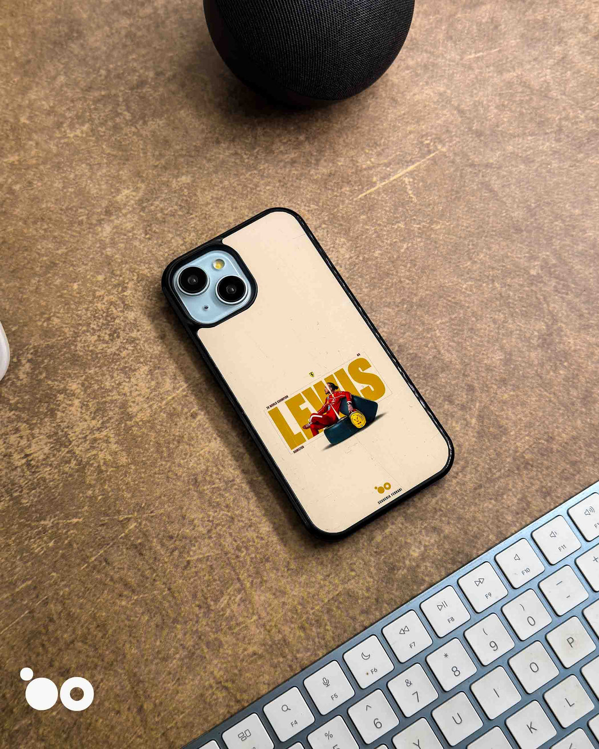 Hamilton 44 iPhone case featuring Lewis Hamilton in a red Ferrari racing suit, golden typography and vintage cream artwork
