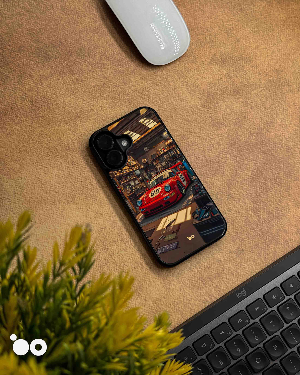 Porsche 911 iPhone case featuring a vintage red racing Porsche with number 95, parked inside a detailed retro garage with warm lighting, workshop tools and automotive memorabilia.