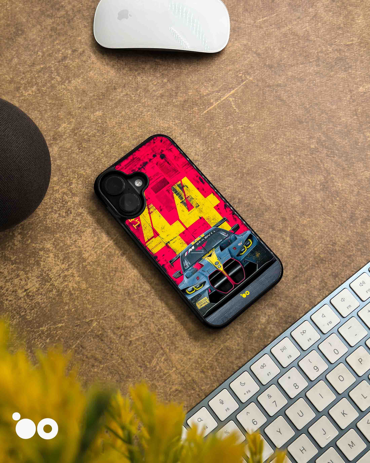 BMW M4 GT3-44 designer iPhone case featuring a front-view BMW M4 GT3 race car with bold yellow 44 graphics on red.
