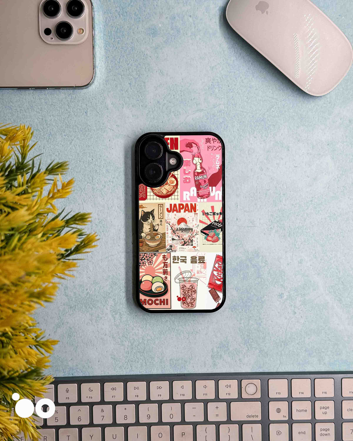 Tokyo Snack Club designer iPhone case with pink Japanese snack collage featuring ramen, Ramune, mochi and Mount Fuji.