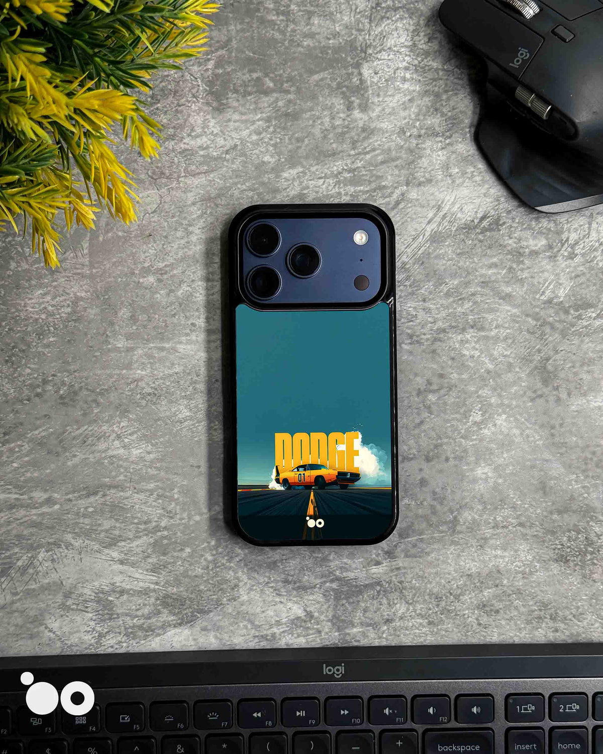 Highway 01 iPhone case featuring an orange Dodge muscle car drifting beneath bold Dodge lettering on a teal backdrop