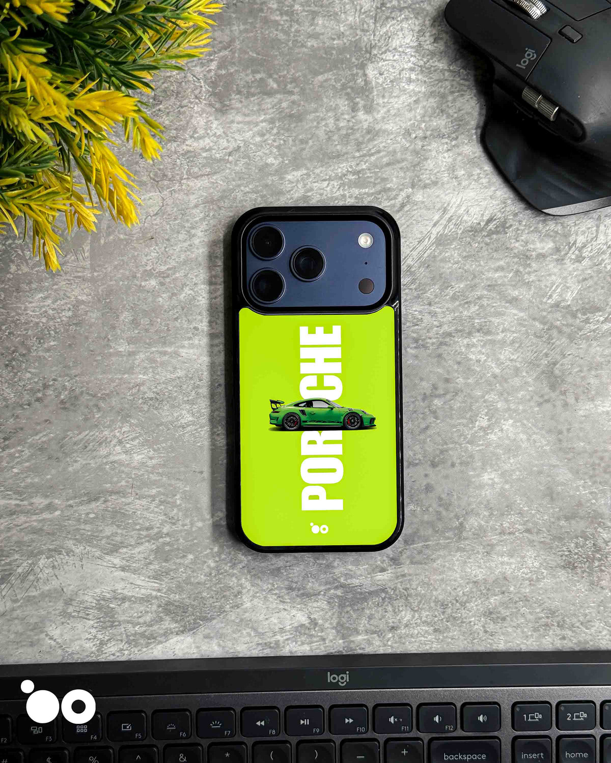 Neon GT Porsche iPhone case featuring a green sports car, bold white Porsche typography and a vibrant neon green background.