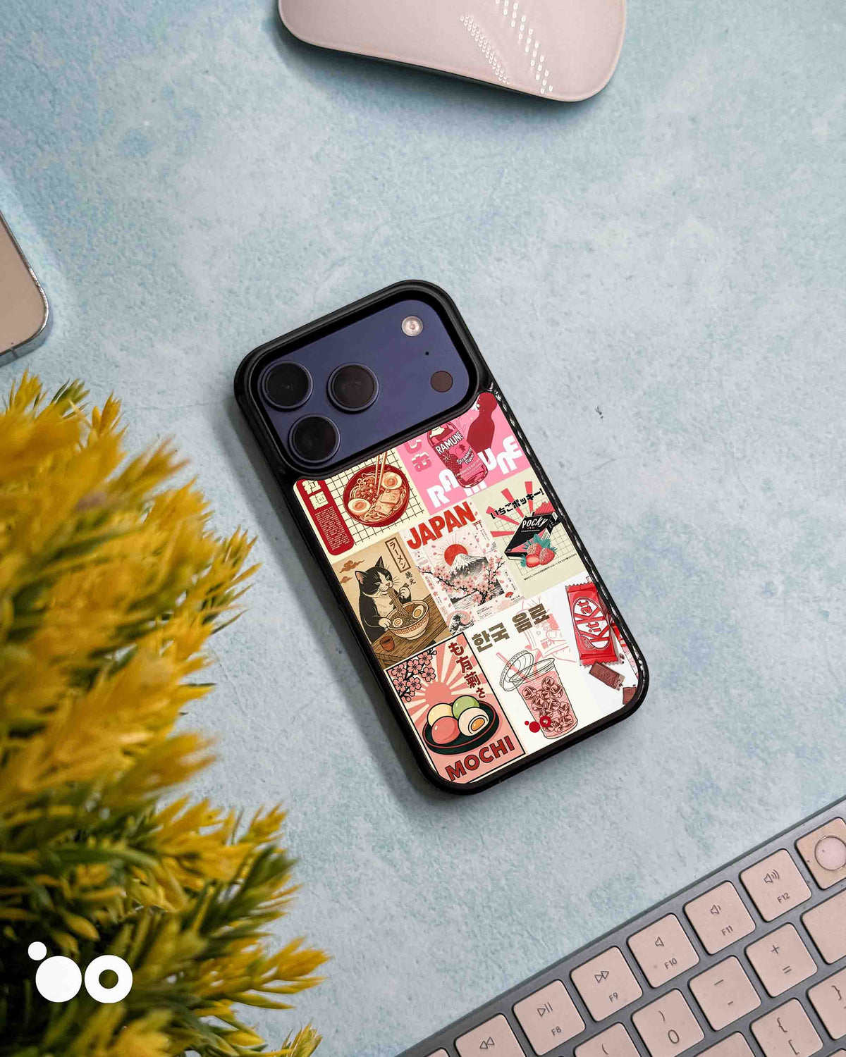 Tokyo Snack Club designer iPhone case with pink Japanese snack collage featuring ramen, Ramune, mochi and Mount Fuji.