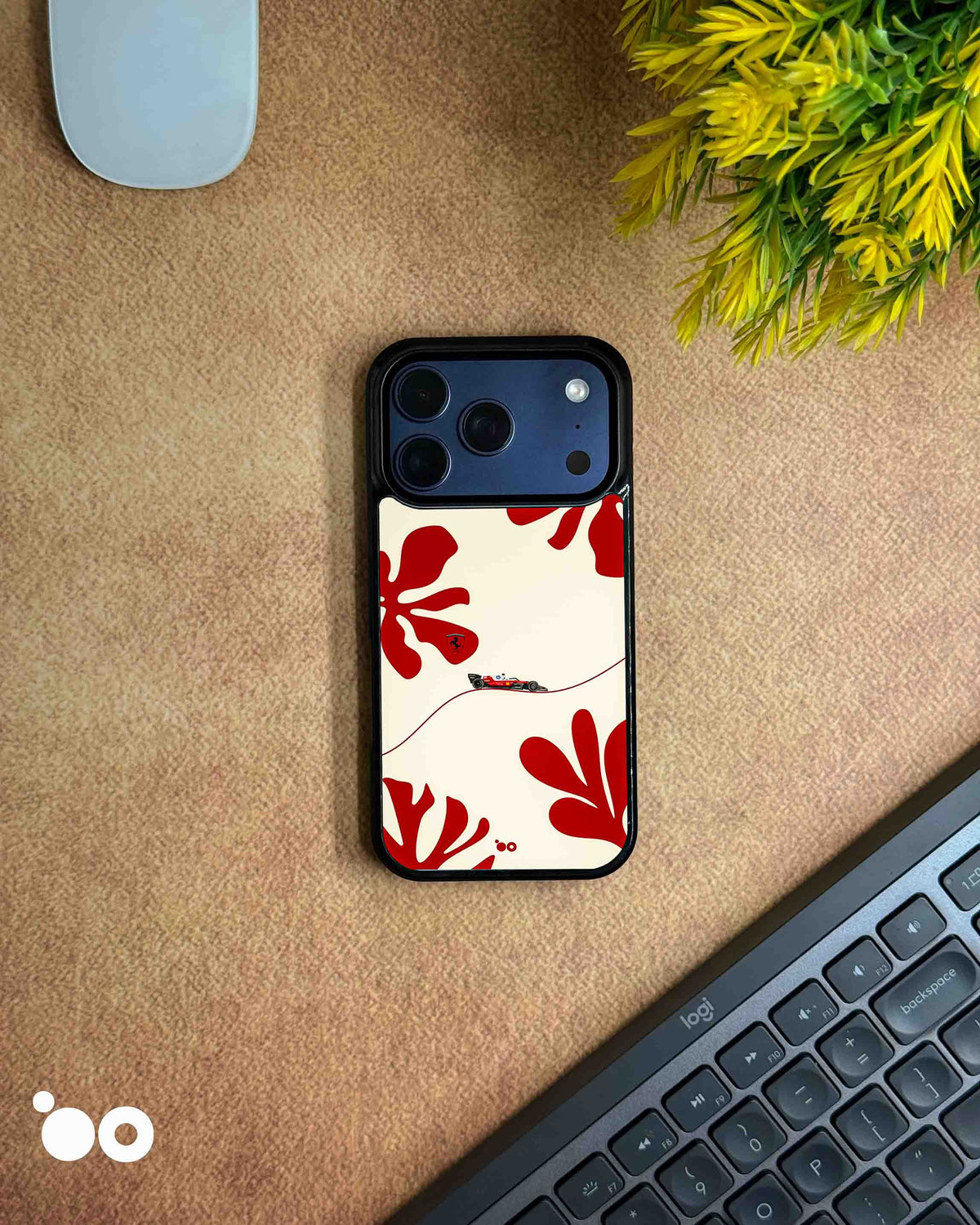 Scuderia Flow iPhone case featuring a miniature Ferrari Formula 1 car, flowing track line and red floral artwork on ivory