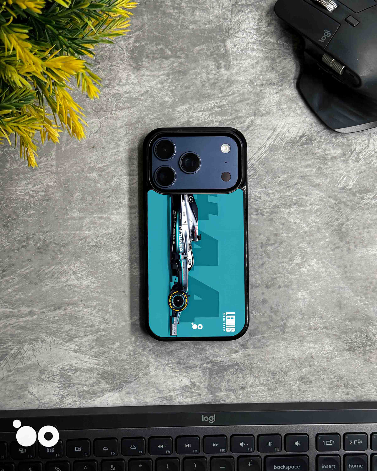 Lewis Hamilton Mercedes Formula One iPhone case featuring a silver Mercedes-AMG Petronas F1 car, number 44 and turquoise racing graphics.