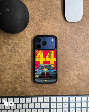 BMW M4 GT3-44 designer iPhone case featuring a front-view BMW M4 GT3 race car with bold yellow 44 graphics on red.