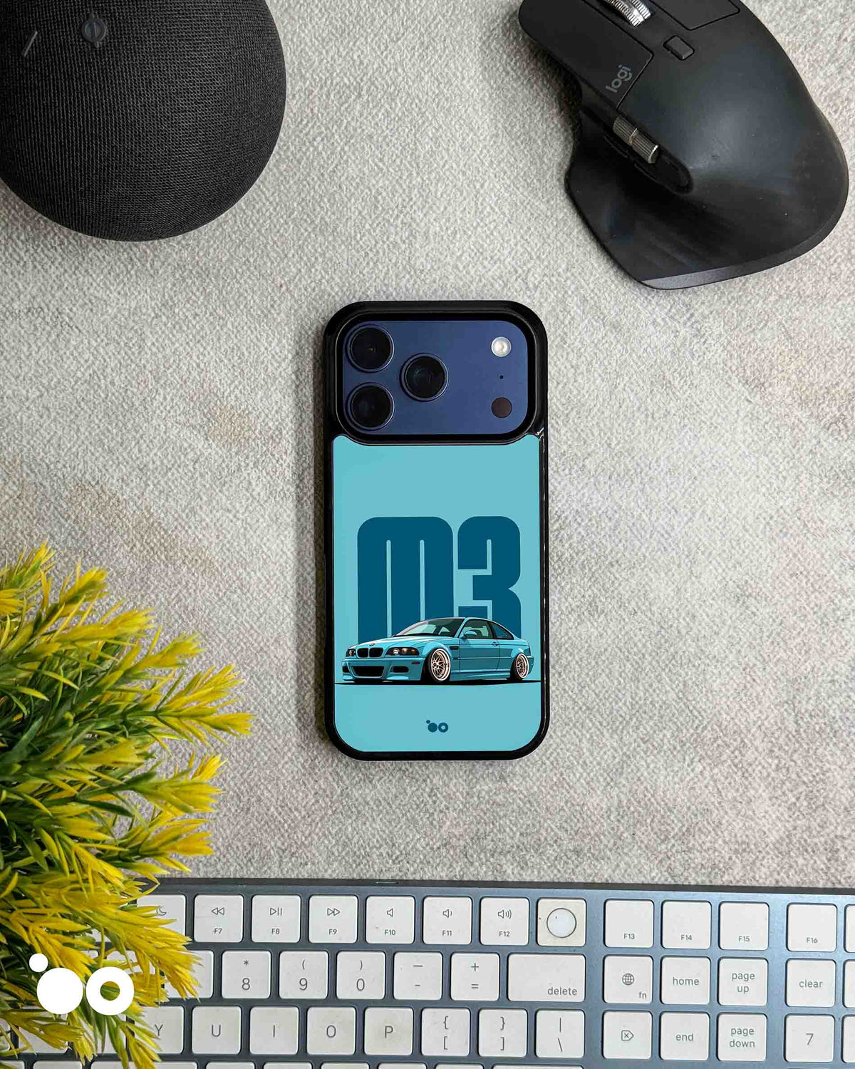 BMW M3 E46 Blue designer iPhone case featuring a blue BMW E46 M3 sports car with bold M3 typography on a light blue background.