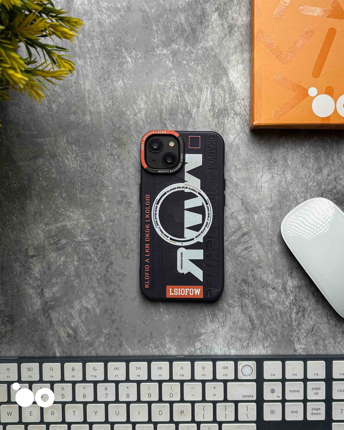 MWK Midnight Navy semi-transparent iPhone case with silver typography, circular graphic and orange accents