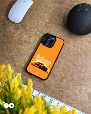 Orange Fury iPhone case featuring an orange Dodge Challenger muscle car, smoky burnout and bold Challenger typography