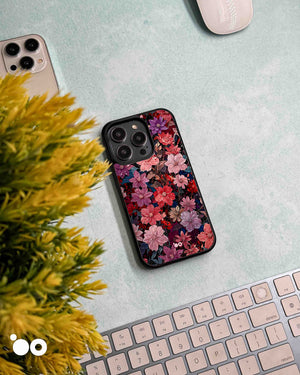 Midnight Bloom floral iPhone case featuring pink, crimson and violet blossoms with dark vintage botanical detailing