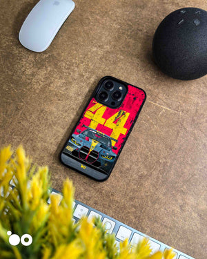BMW M4 GT3-44 designer iPhone case featuring a front-view BMW M4 GT3 race car with bold yellow 44 graphics on red.