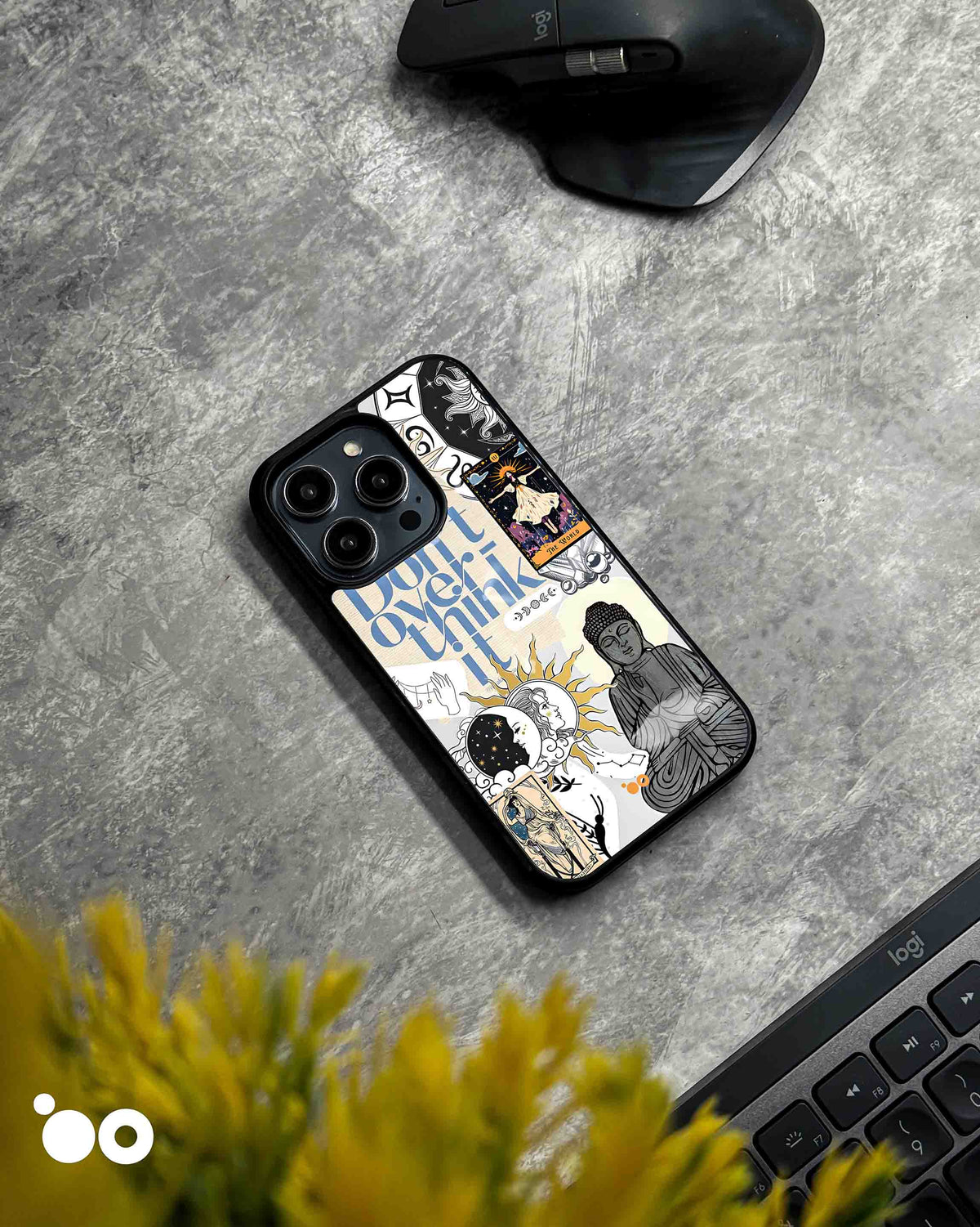 Cosmic Reverie designer iPhone case featuring celestial sun and moon artwork, tarot cards, Buddha and blue typography.